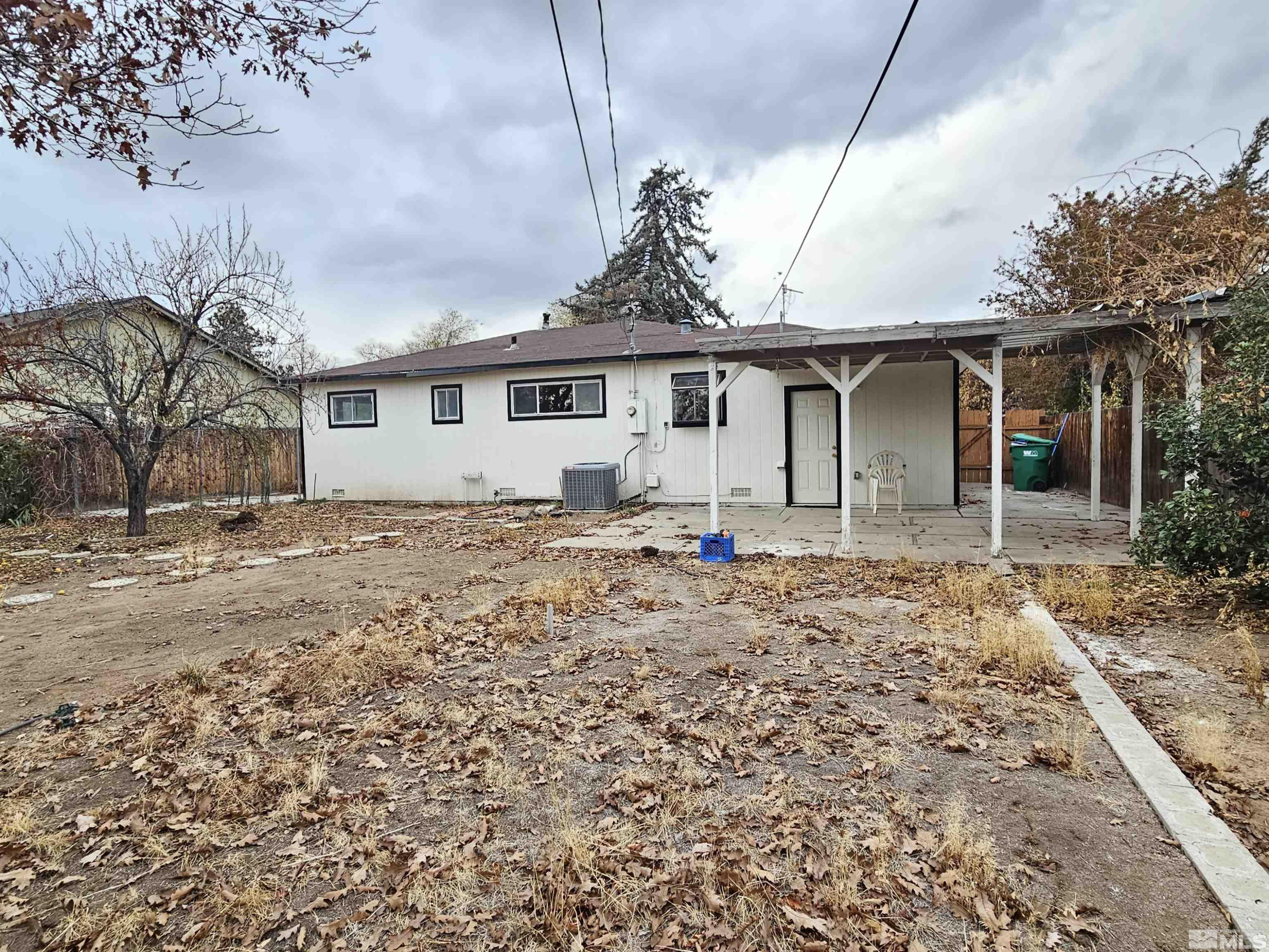 1970 Citron Street Reno, NV 89512 - Photo 7 of 15 a view of a house with a yard
