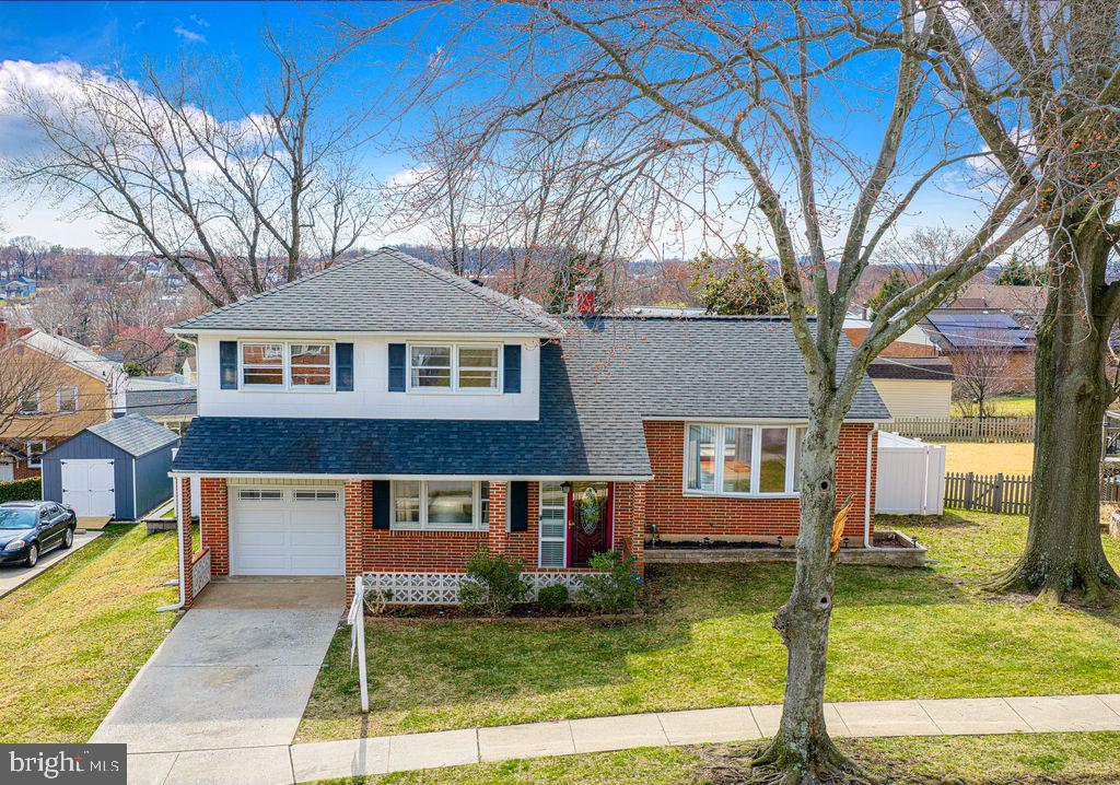 8007 Sagramore Road Baltimore, MD 21237 - Photo 1 of 41 a front view of a house with garden