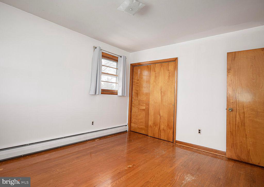8007 Sagramore Road Baltimore, MD 21237 - Photo 25 of 41 an empty room with window
