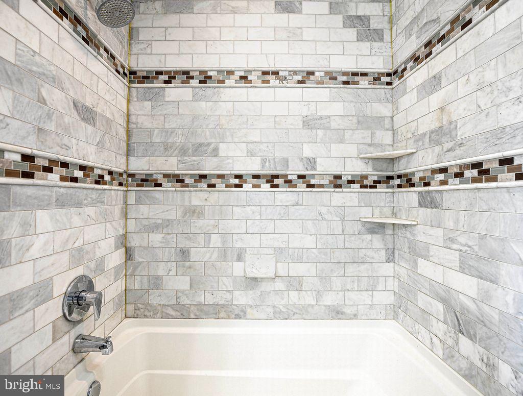 8007 Sagramore Road Baltimore, MD 21237 - Photo 27 of 41 a bathroom with a shower