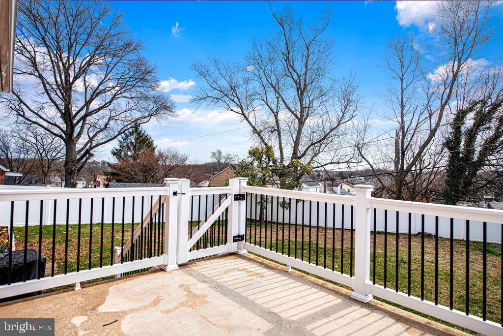 8007 Sagramore Road Baltimore, MD 21237 - Photo 29 of 41 a view of a wooden roof deck