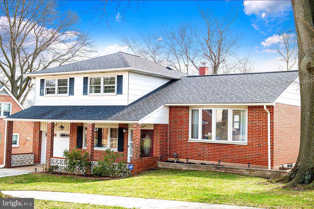 8007 Sagramore Road Baltimore, MD 21237 - Photo 35 of 41 a front view of house with yard