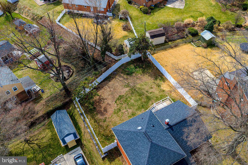 8007 Sagramore Road Baltimore, MD 21237 - Photo 37 of 41 an aerial view of a house with a yard and potted plants