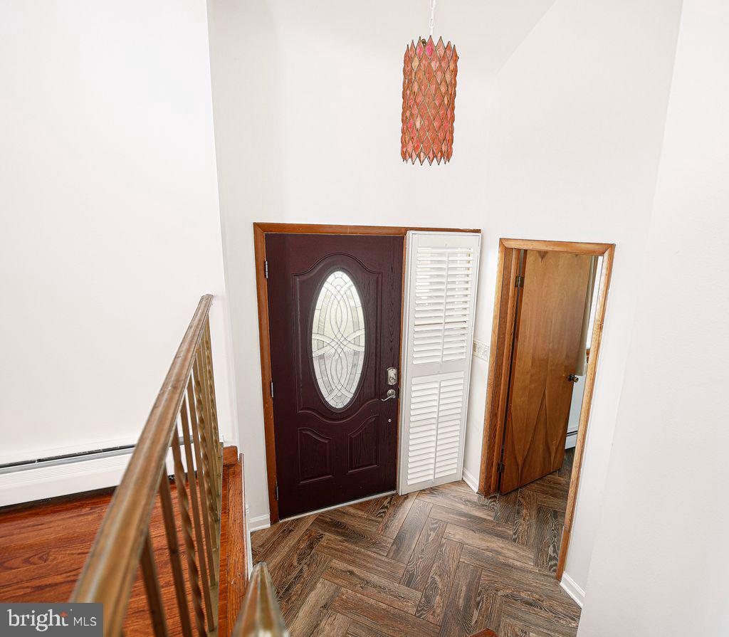8007 Sagramore Road Baltimore, MD 21237 - Photo 4 of 41 a view of a hallway with washer and dryer
