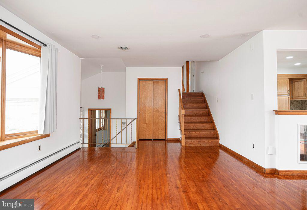 8007 Sagramore Road Baltimore, MD 21237 - Photo 8 of 41 a view of entryway with wooden floor