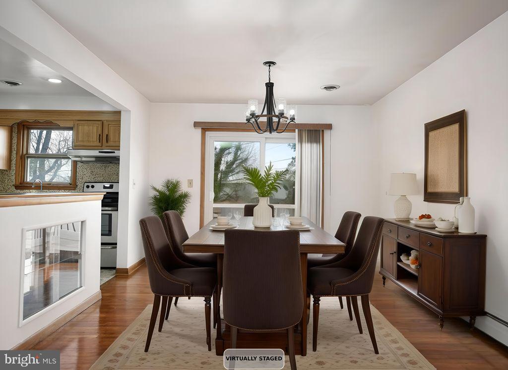 8007 Sagramore Road Baltimore, MD 21237 - Photo 10 of 41 a view of a dining room with furniture window and outside view