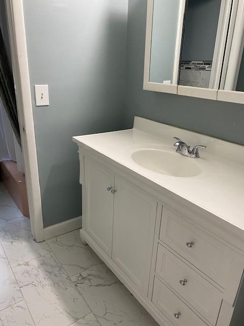 9 Howland Avenue Long Branch, NJ 07740 - Photo 11 of 18 a bathroom with a sink and a mirror