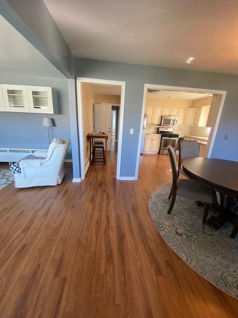 9 Howland Avenue Long Branch, NJ 07740 - Photo 2 of 18 a living room with furniture and a wooden floor