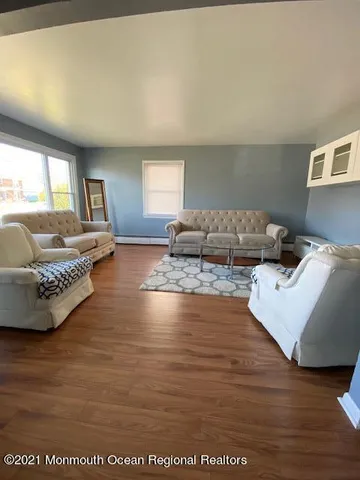 a living room with furniture and a couch