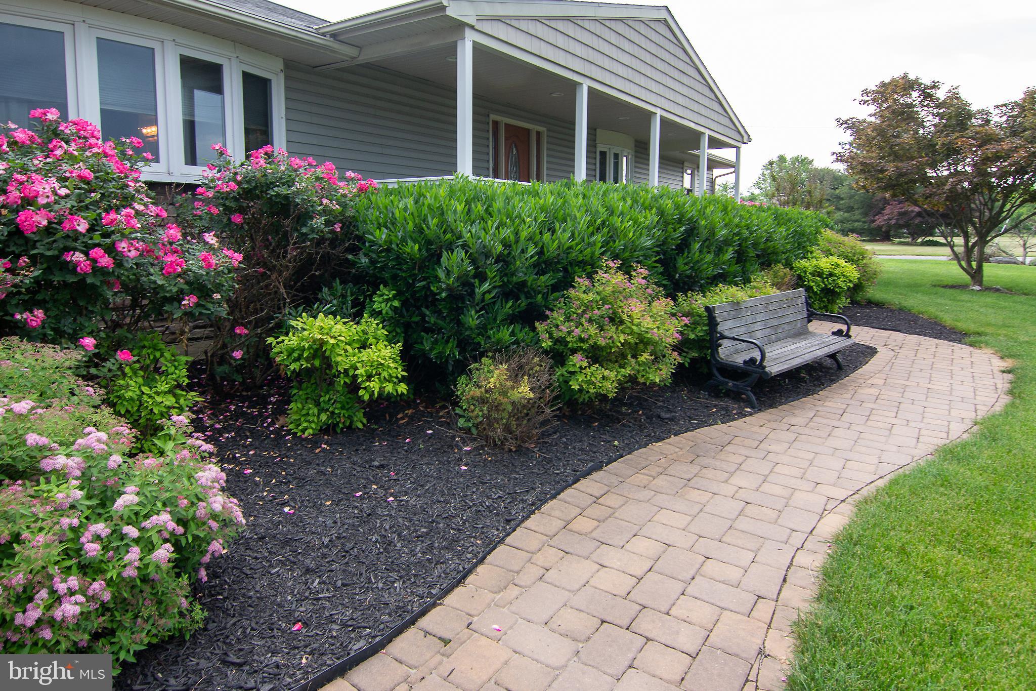 563 Oak Tree Road Westminster, MD 21157 - Photo 2 of 41 a view of a house with a yard and garden