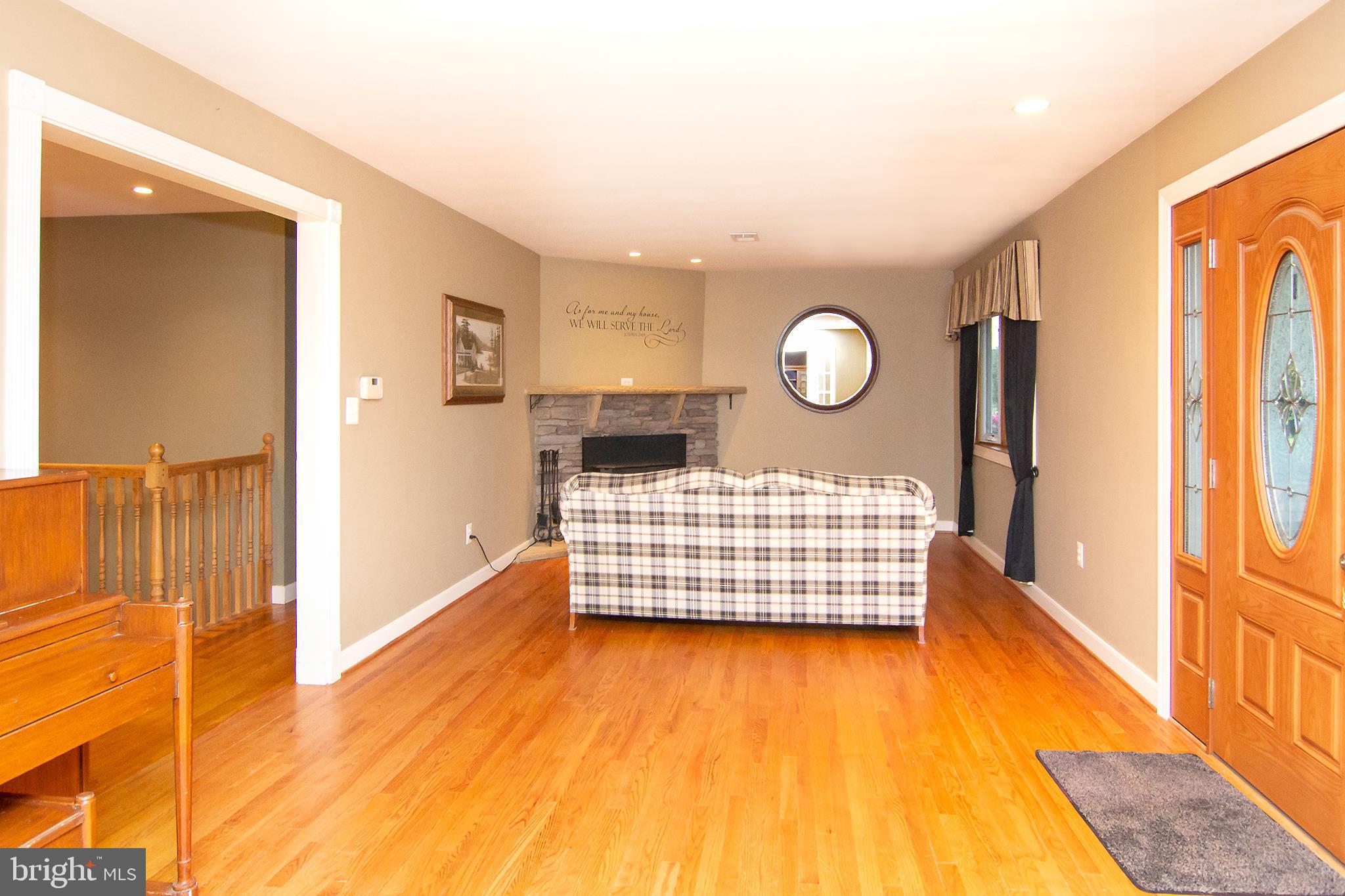 563 Oak Tree Road Westminster, MD 21157 - Photo 18 of 41 a view of a room with wooden floor and window