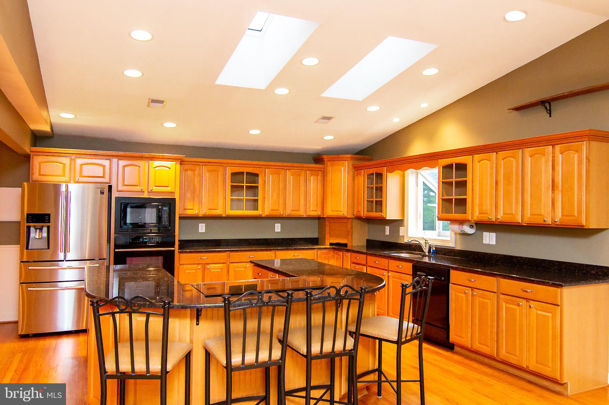 563 Oak Tree Road Westminster, MD 21157 - Photo 4 of 41 a view of a kitchen with a large window