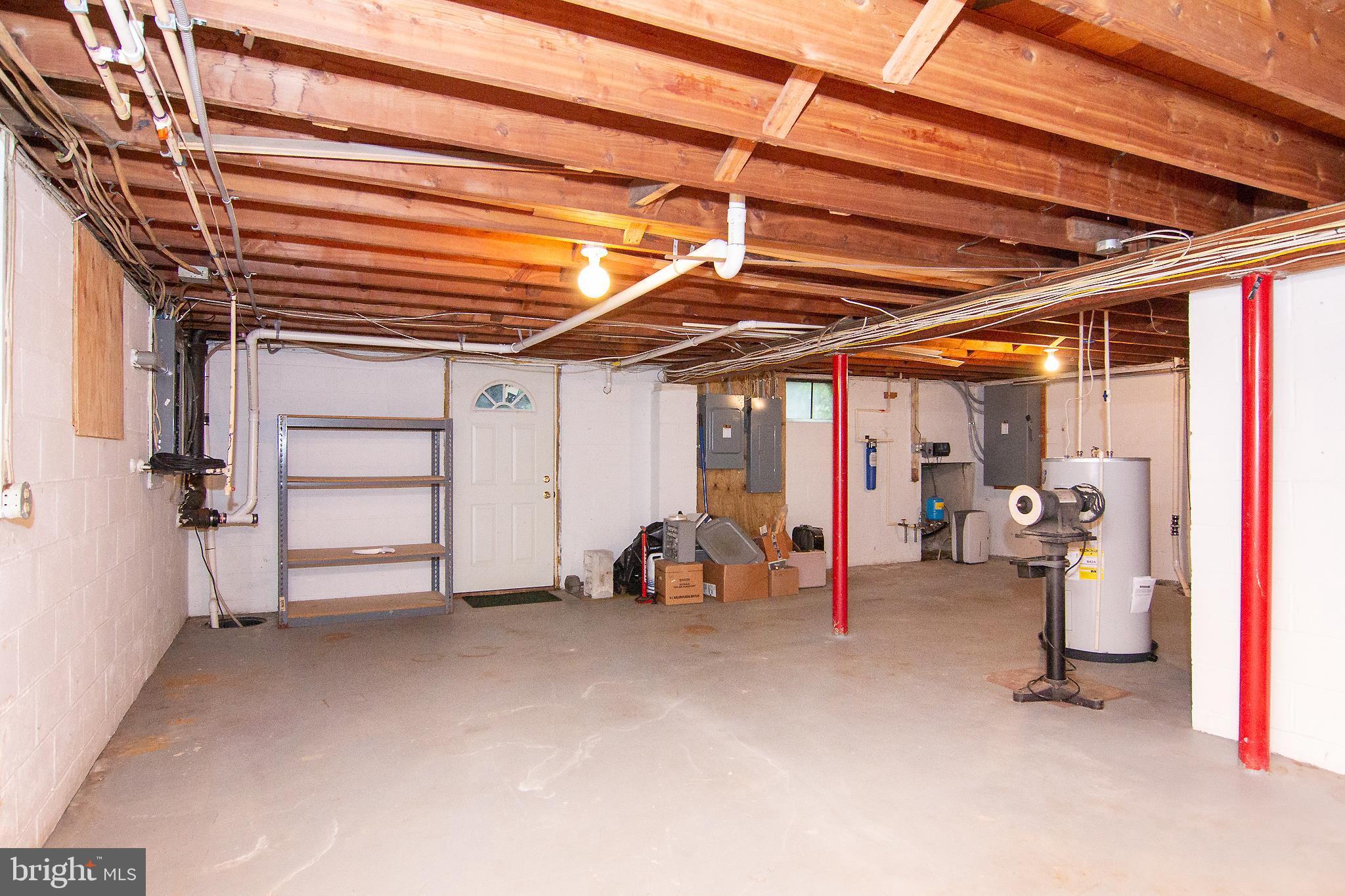 563 Oak Tree Road Westminster, MD 21157 - Photo 34 of 41 a view of a big room with air conditioner duct and materials on floor
