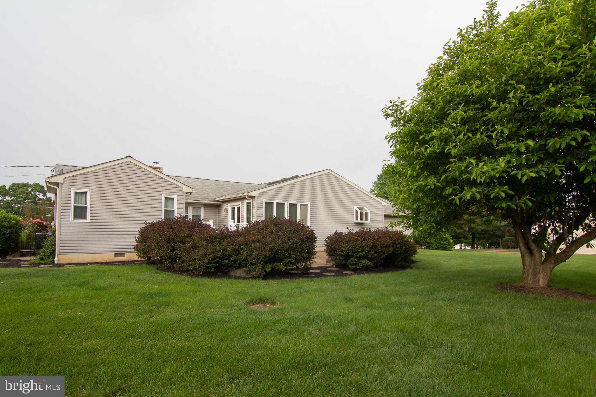 563 Oak Tree Road Westminster, MD 21157 - Photo 37 of 41 a front view of a house with garden