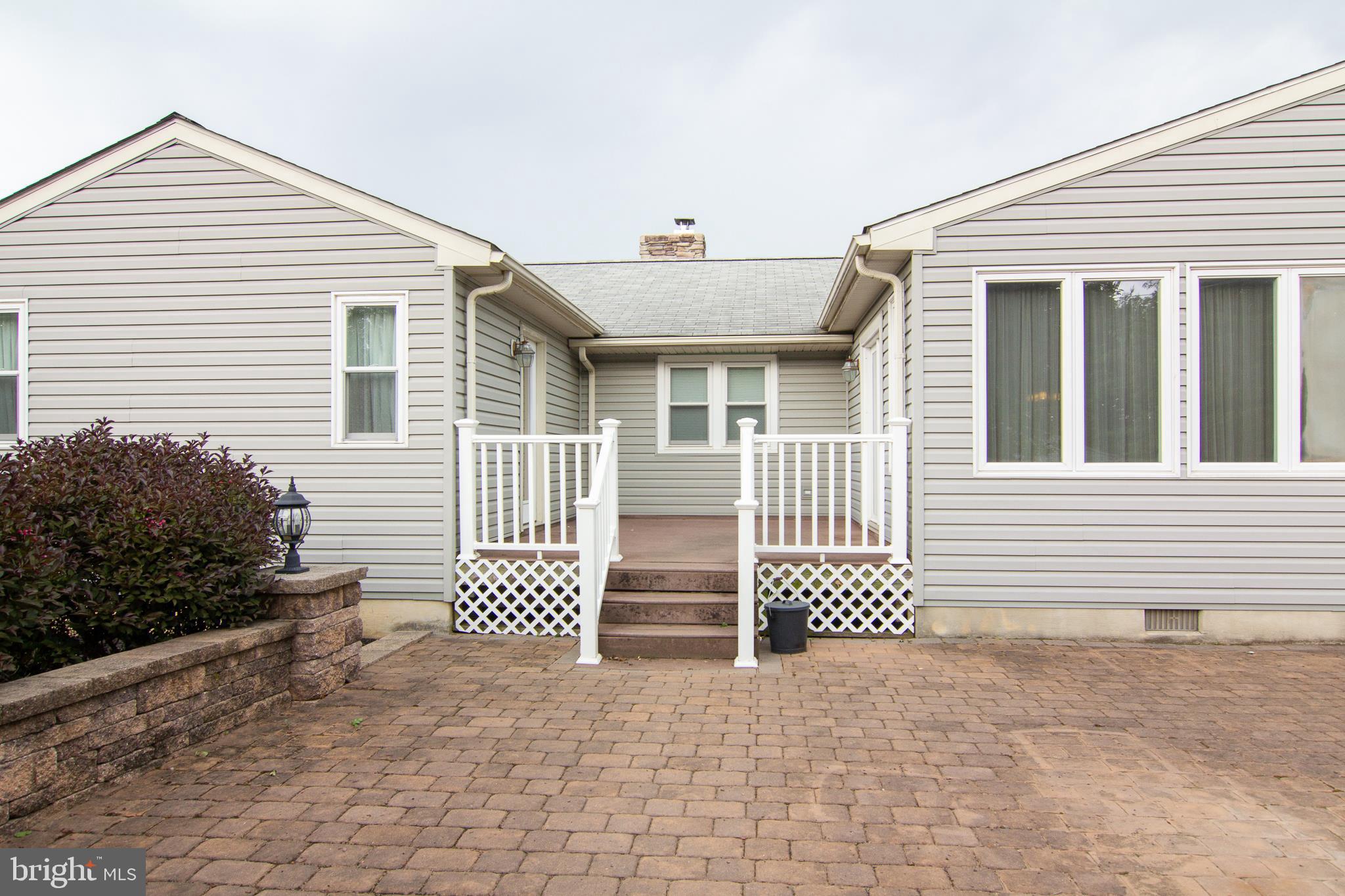 563 Oak Tree Road Westminster, MD 21157 - Photo 40 of 41 a front view of a house with a garage
