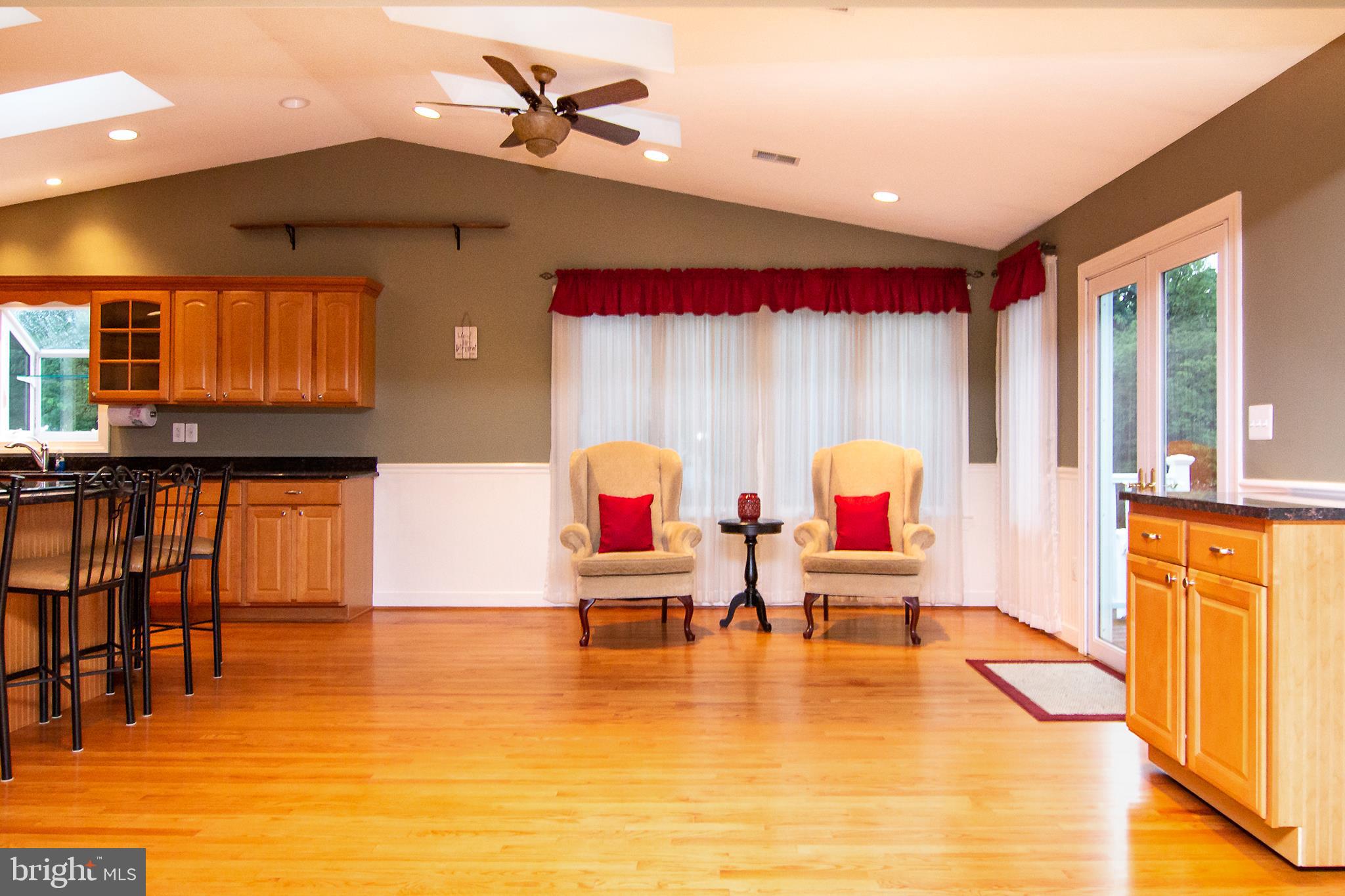 563 Oak Tree Road Westminster, MD 21157 - Photo 9 of 41 a living room with stainless steel appliances furniture and a large window