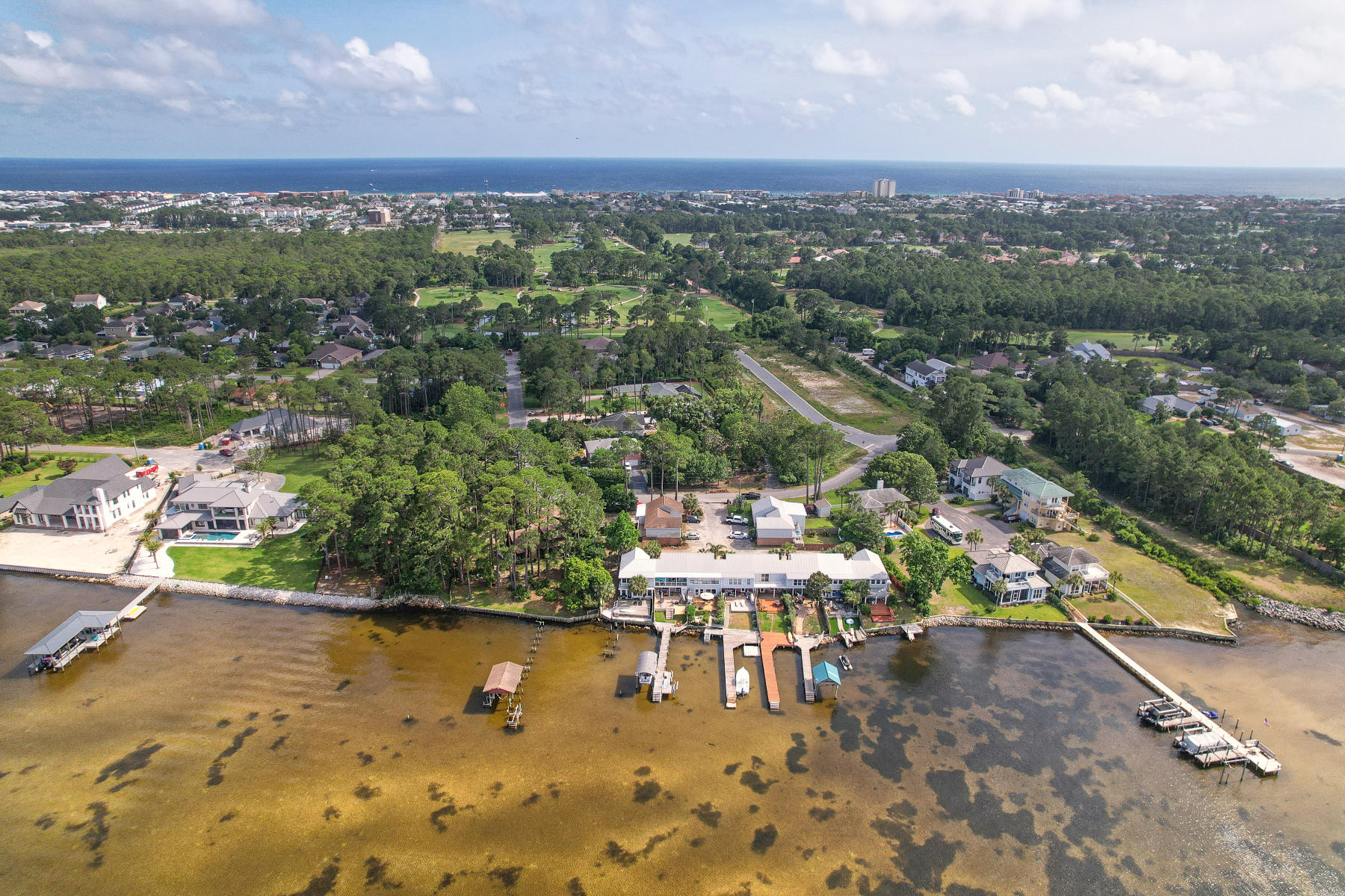 126 Walton Way, Unit 10 Miramar Beach, FL 32550 - Photo 1 of 28 an aerial view of a houses with a yard