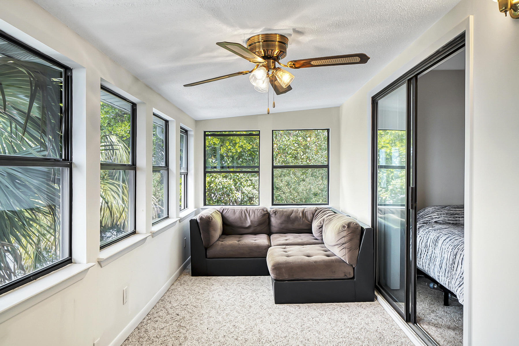 126 Walton Way, Unit 10 Miramar Beach, FL 32550 - Photo 17 of 28 a living room with furniture and a large window