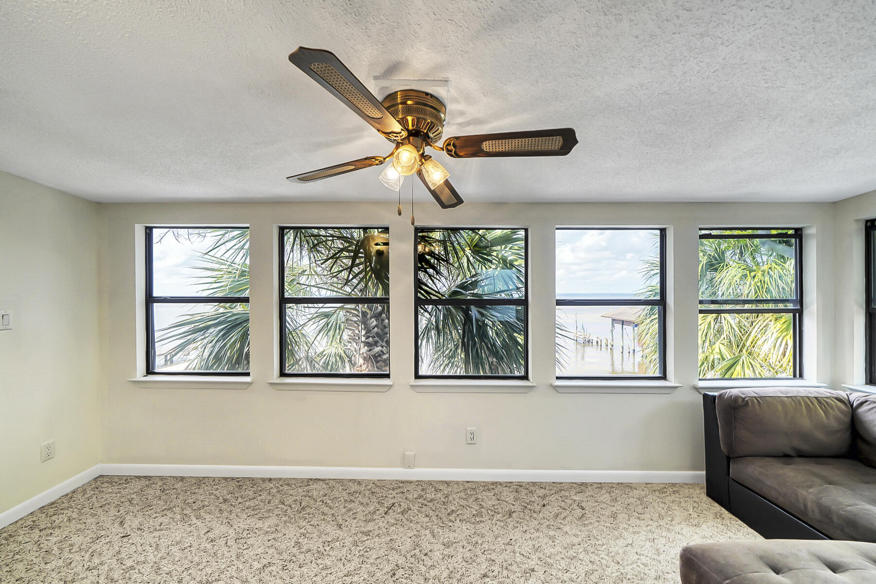 126 Walton Way, Unit 10 Miramar Beach, FL 32550 - Photo 18 of 28 a living room with furniture and a window