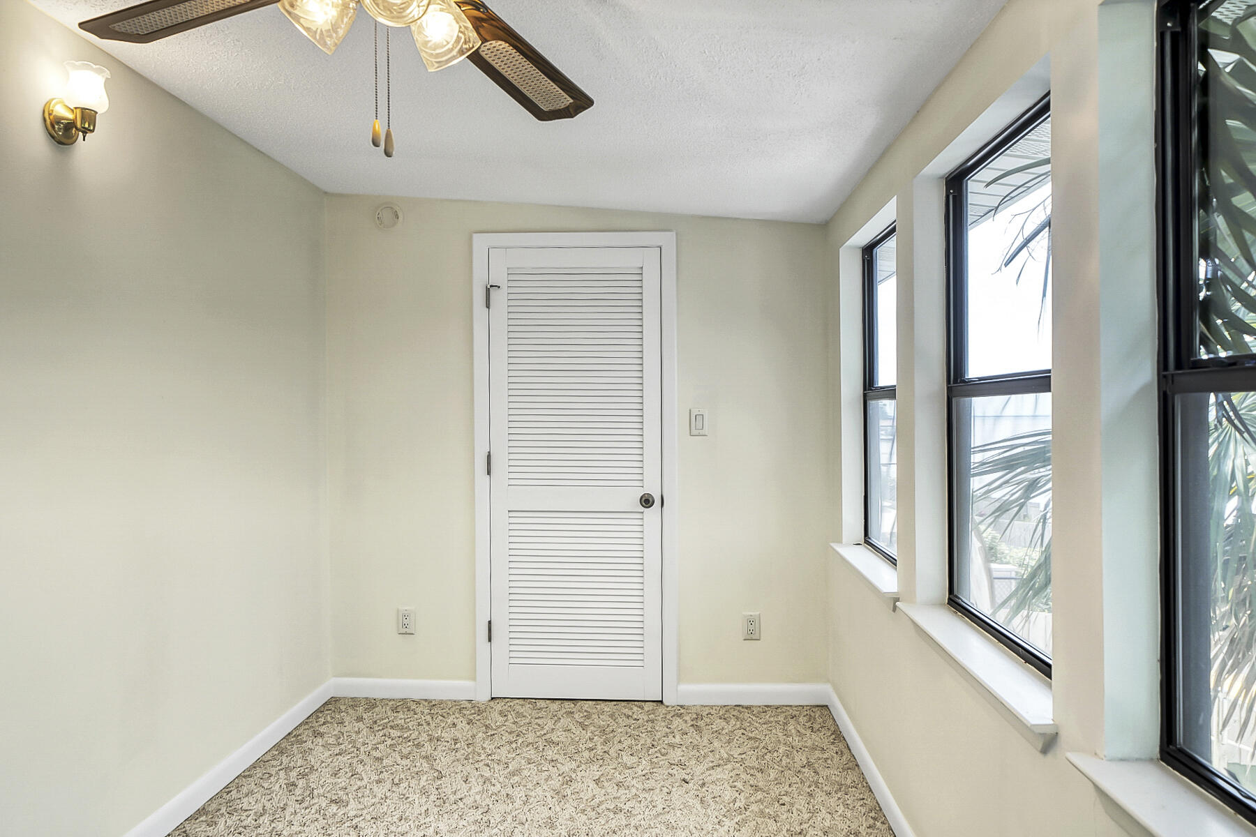 126 Walton Way, Unit 10 Miramar Beach, FL 32550 - Photo 19 of 28 a view of an empty room with a window