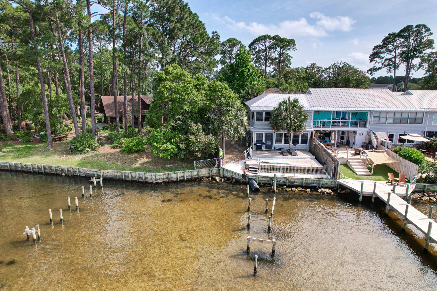 126 Walton Way, Unit 10 Miramar Beach, FL 32550 - Photo 3 of 28 a view of a lake with a patio