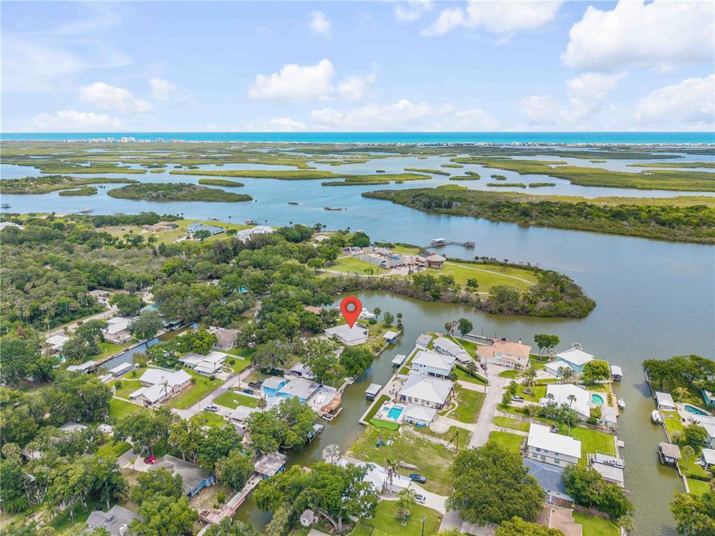 192 Azalea Road Edgewater, FL 32141 - Photo 79 of 94 a view of an ocean and beach