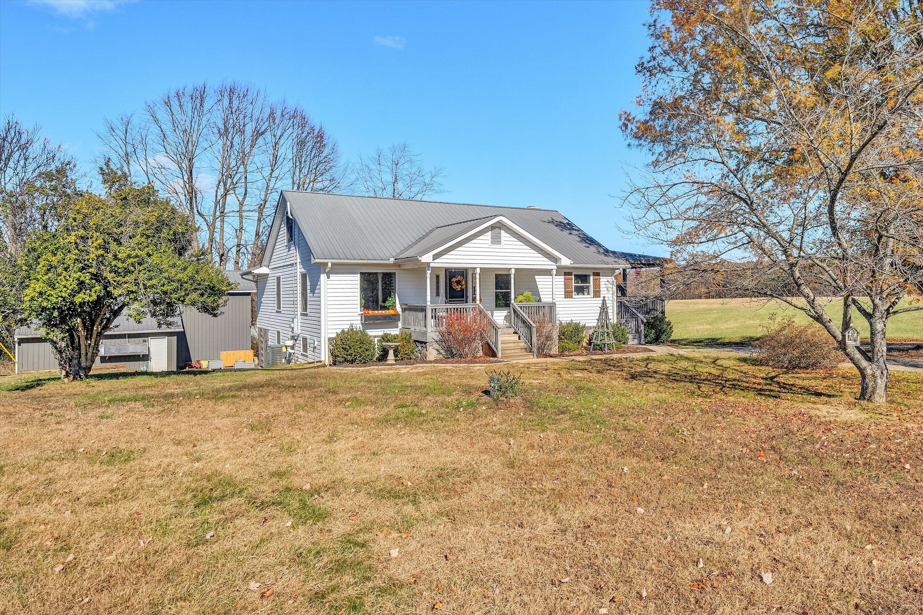1620 Ayers Road Moneta, VA 24121 - Photo 1 of 63 a front view of a house with a yard