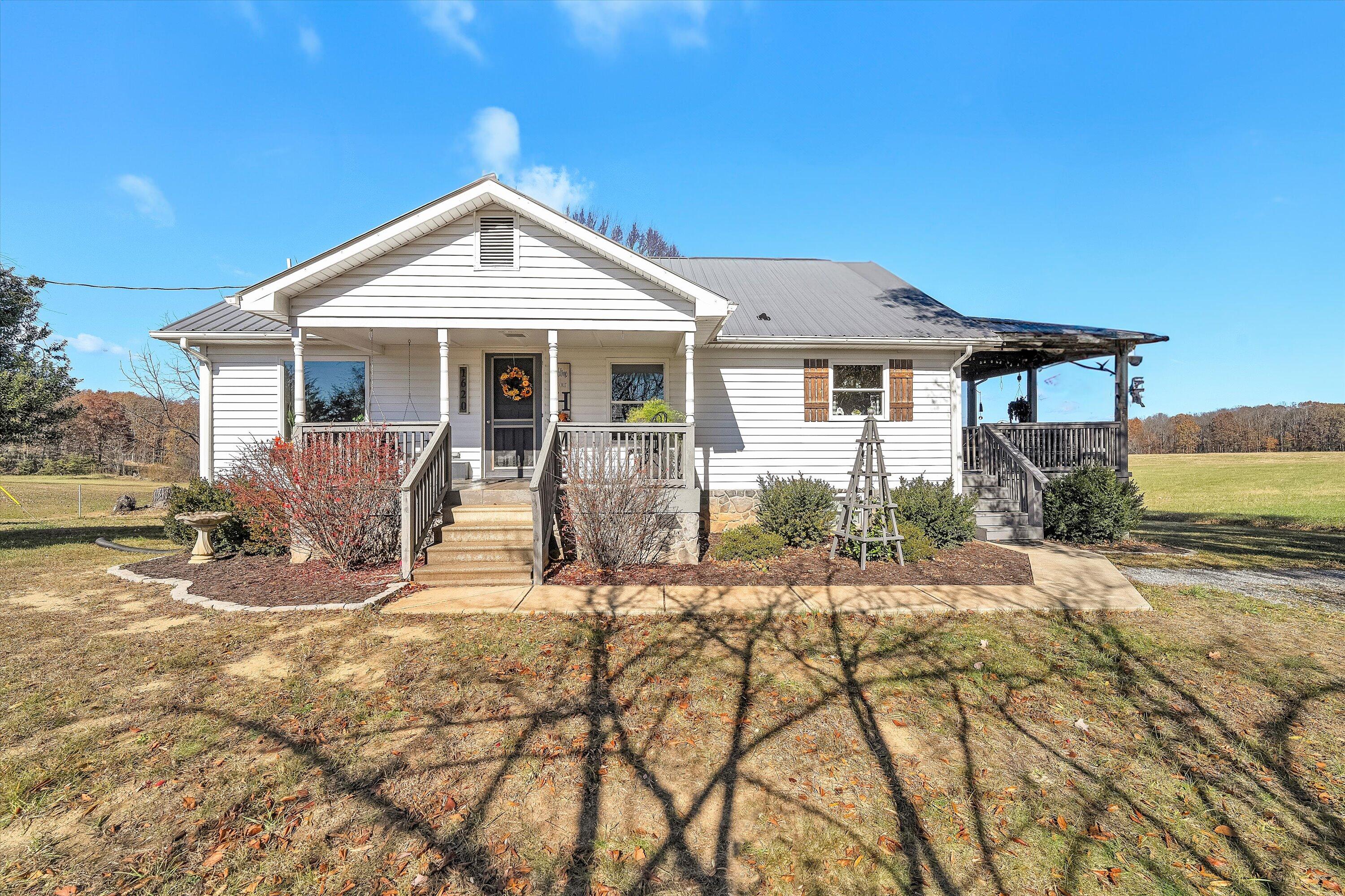 1620 Ayers Road Moneta, VA 24121 - Photo 3 of 63 a view of a house with backyard and sitting area