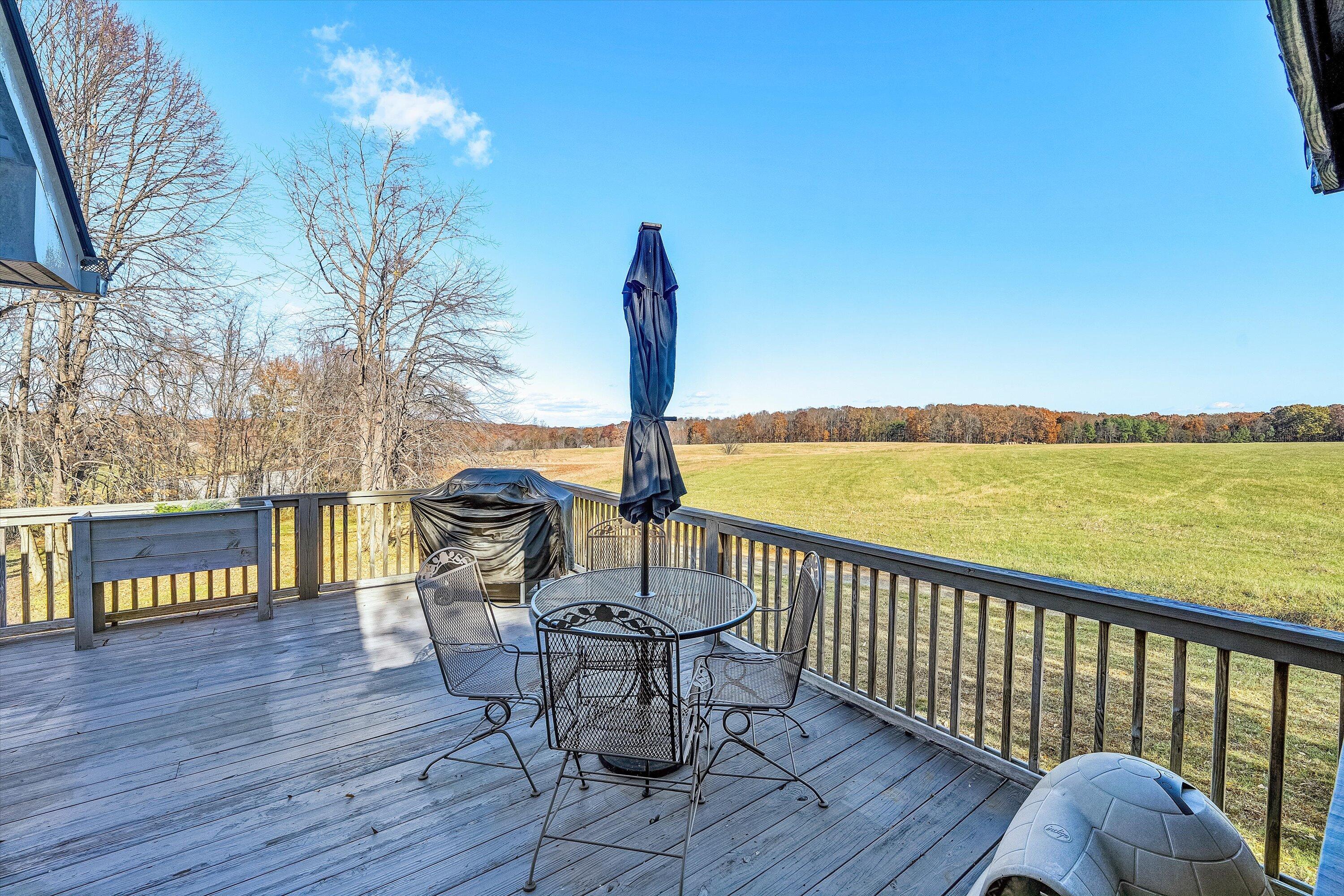 1620 Ayers Road Moneta, VA 24121 - Photo 50 of 63 a view of a balcony with lake view and wooden floor