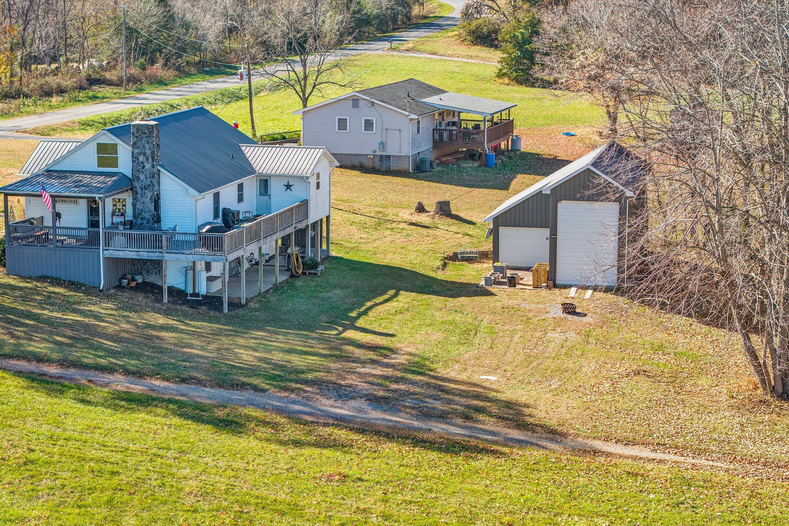 1620 Ayers Road Moneta, VA 24121 - Photo 59 of 63 a view of a house with swimming pool and sitting area