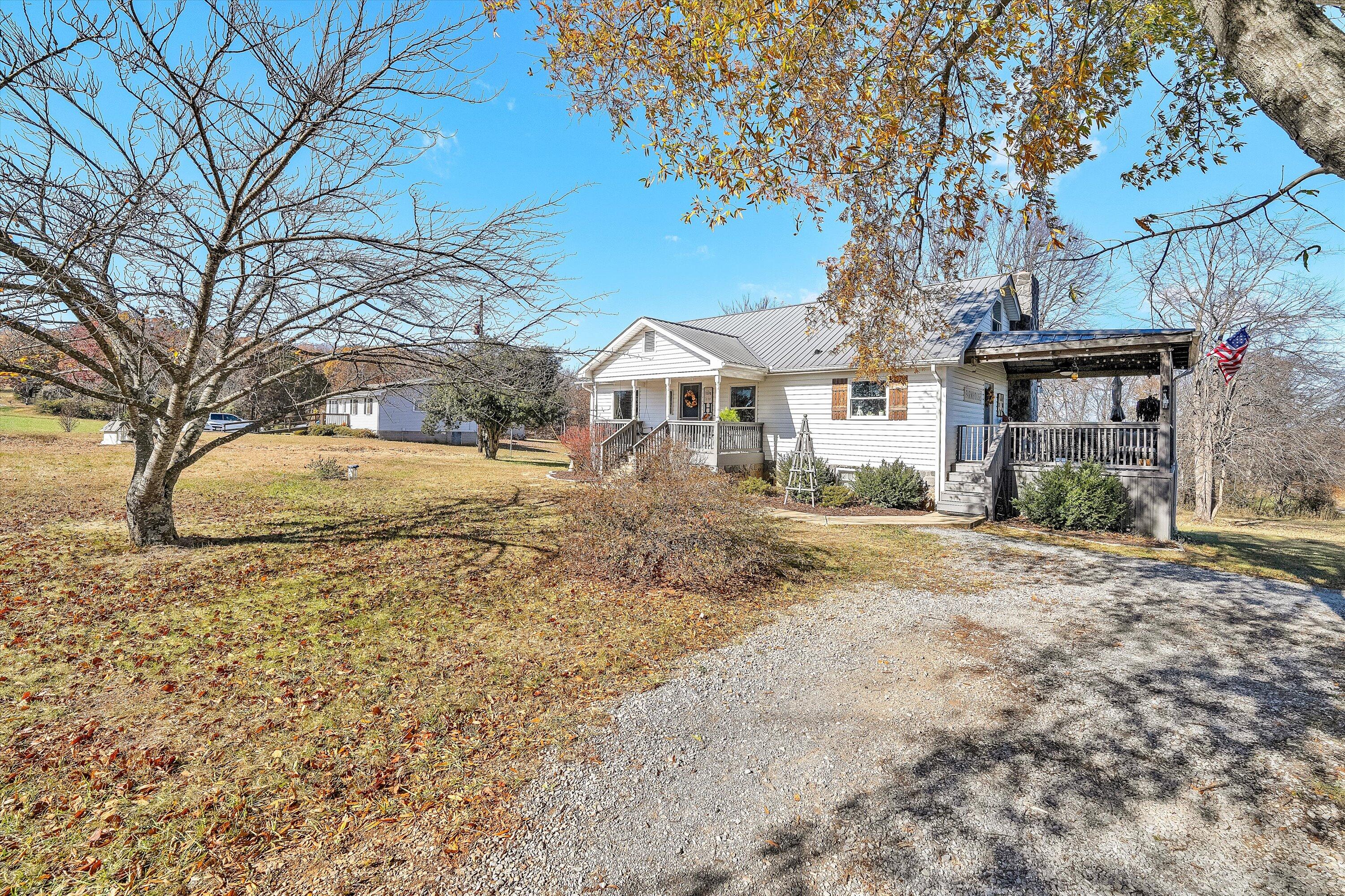 1620 Ayers Road Moneta, VA 24121 - Photo 6 of 63 a front view of a house with a yard