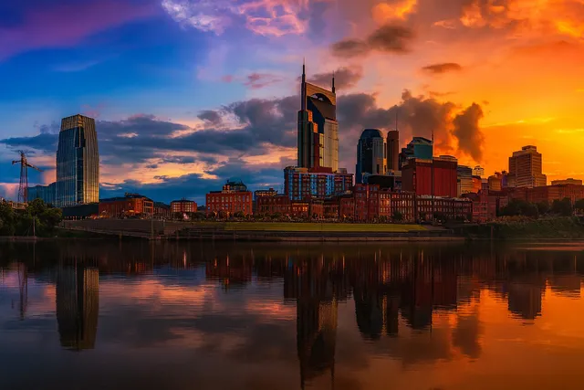 a bathroom with a sink toilet and mirror