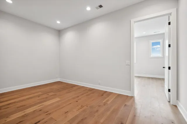 a close view of a sink and a mirror on a wall