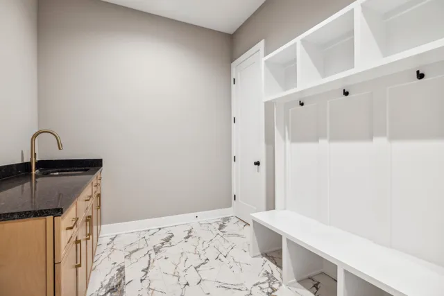 a bedroom with a bed and a cabinets