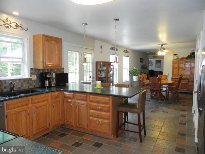 193 Red Fox Road Harpers Ferry, WV 25425 - Photo 13 of 30 Kitchen into Dining Area w/ Ceramic Floors