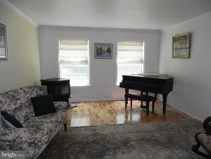 193 Red Fox Road Harpers Ferry, WV 25425 - Photo 6 of 30 Formal Living Room w/ Hardwood Floor