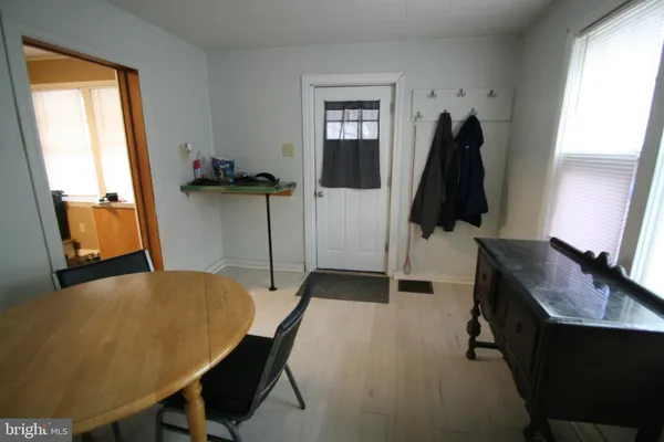 a workspace with furniture and window