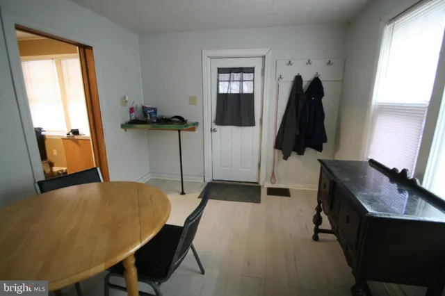 a workspace with furniture and window