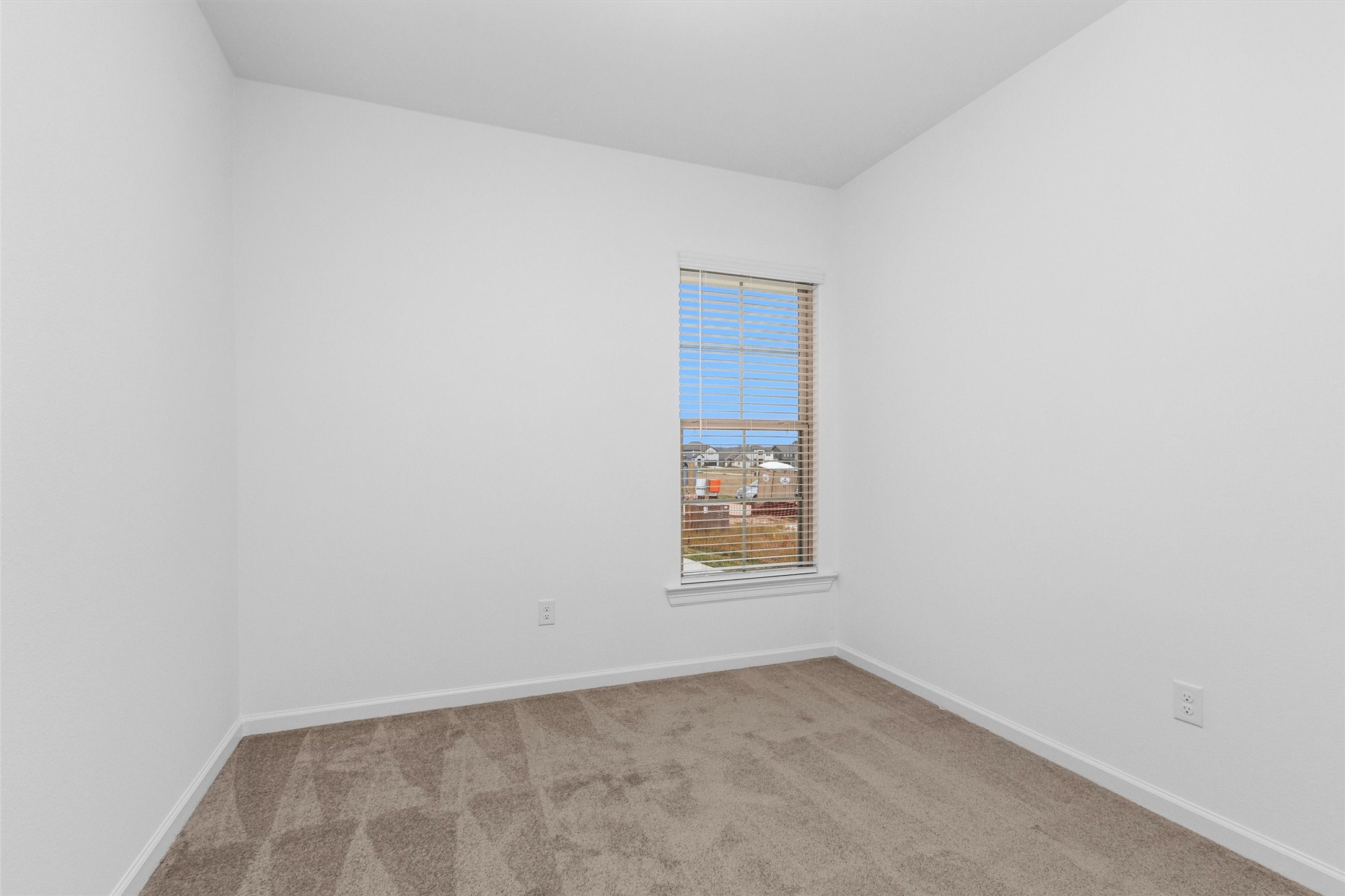 40700 Pessi Road Magnolia, TX 77354 - Photo 12 of 29 an empty room with windows