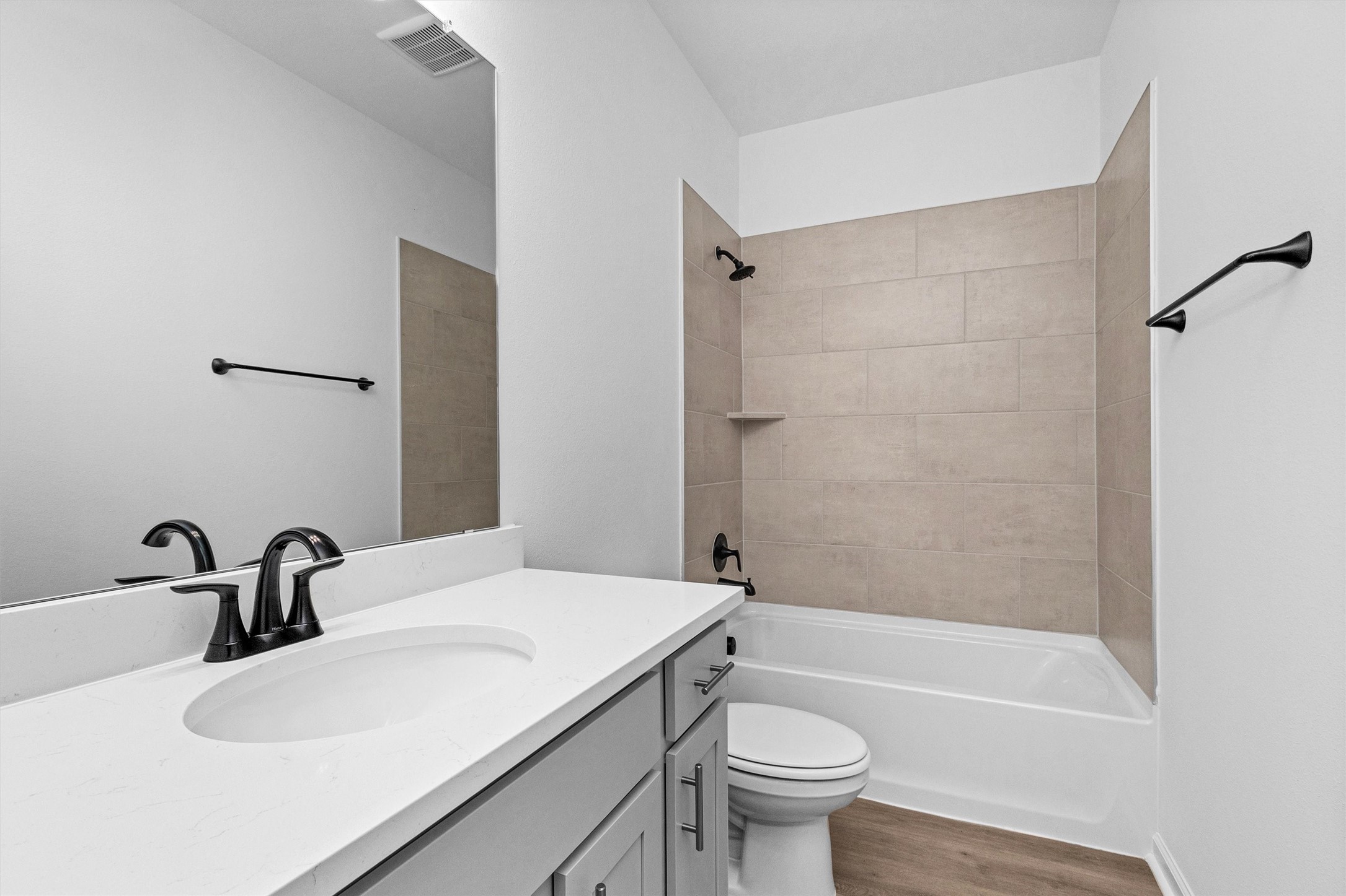 40700 Pessi Road Magnolia, TX 77354 - Photo 14 of 29 a bathroom with a sink a toilet and a bathtub