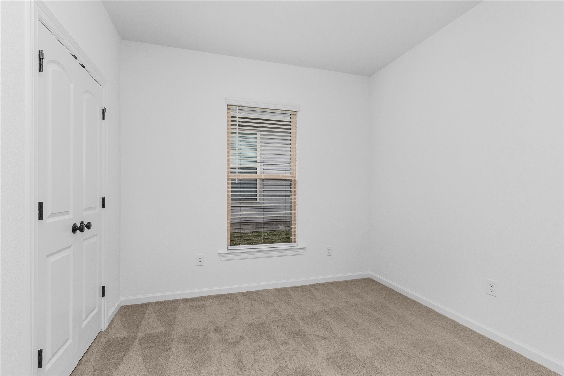 40700 Pessi Road Magnolia, TX 77354 - Photo 15 of 29 a view of an empty room with a window