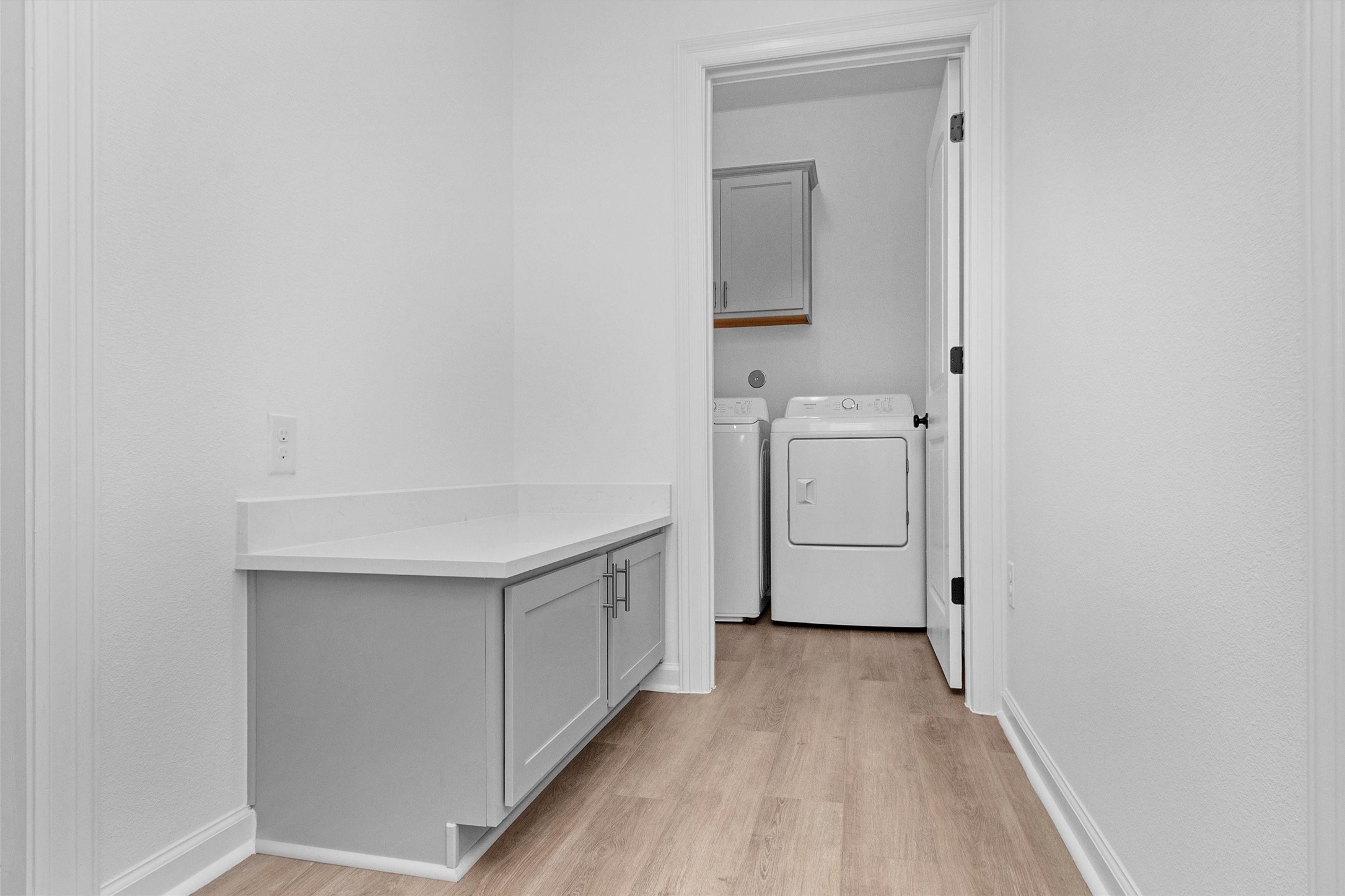 40700 Pessi Road Magnolia, TX 77354 - Photo 17 of 29 a view of cabinets and wooden floor