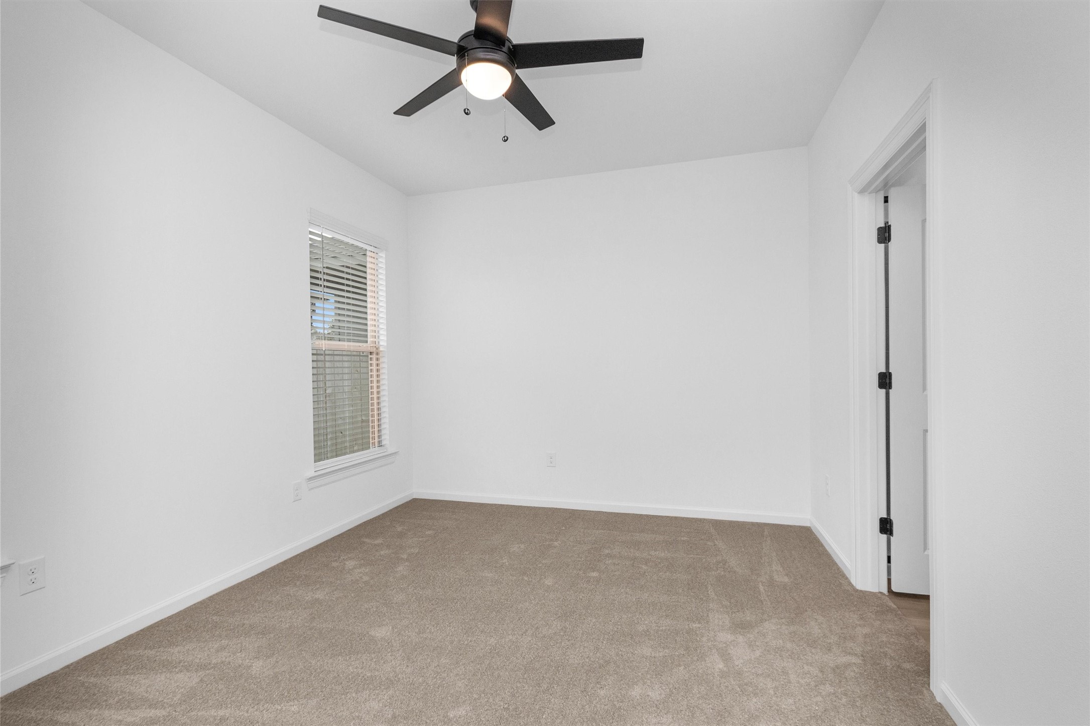 40700 Pessi Road Magnolia, TX 77354 - Photo 19 of 29 an empty room with a empty space and windows