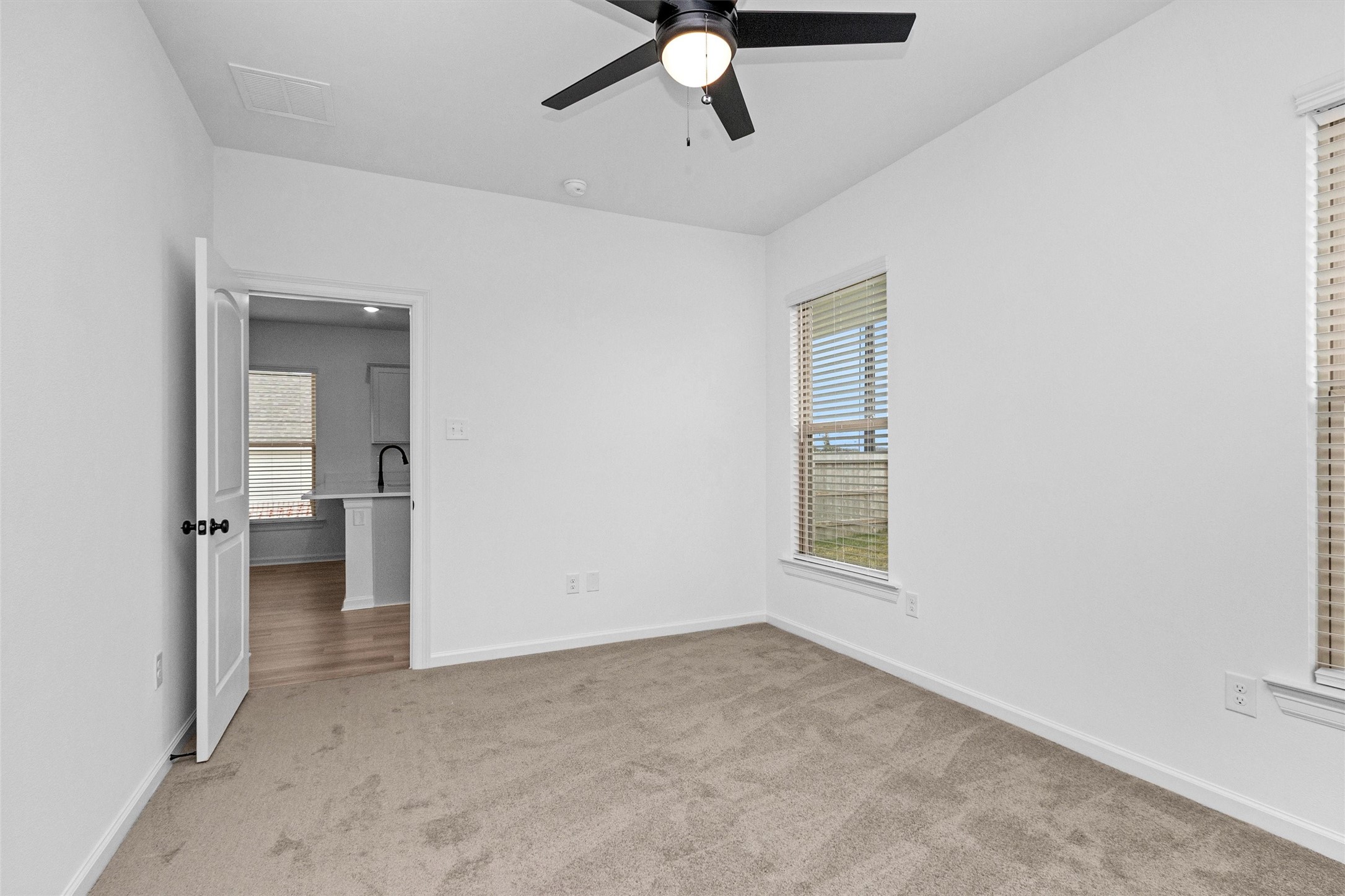 40700 Pessi Road Magnolia, TX 77354 - Photo 20 of 29 an empty room that has a window and a ceiling fan