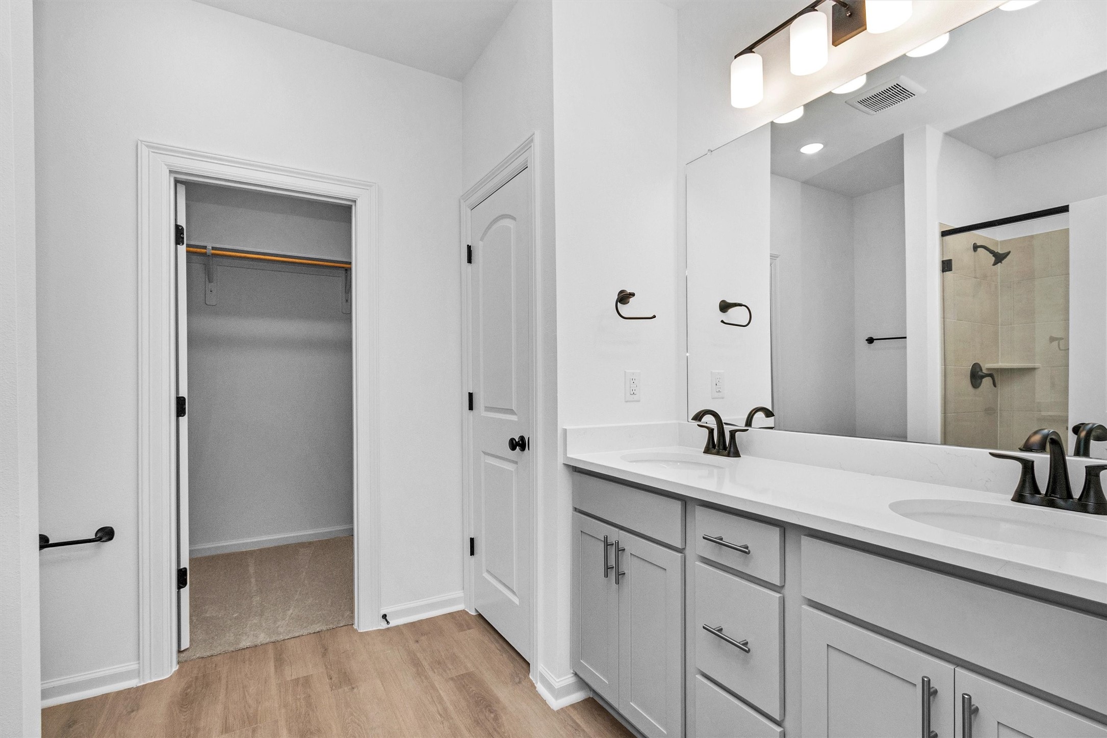 40700 Pessi Road Magnolia, TX 77354 - Photo 23 of 29 a bathroom with a sink and a mirror