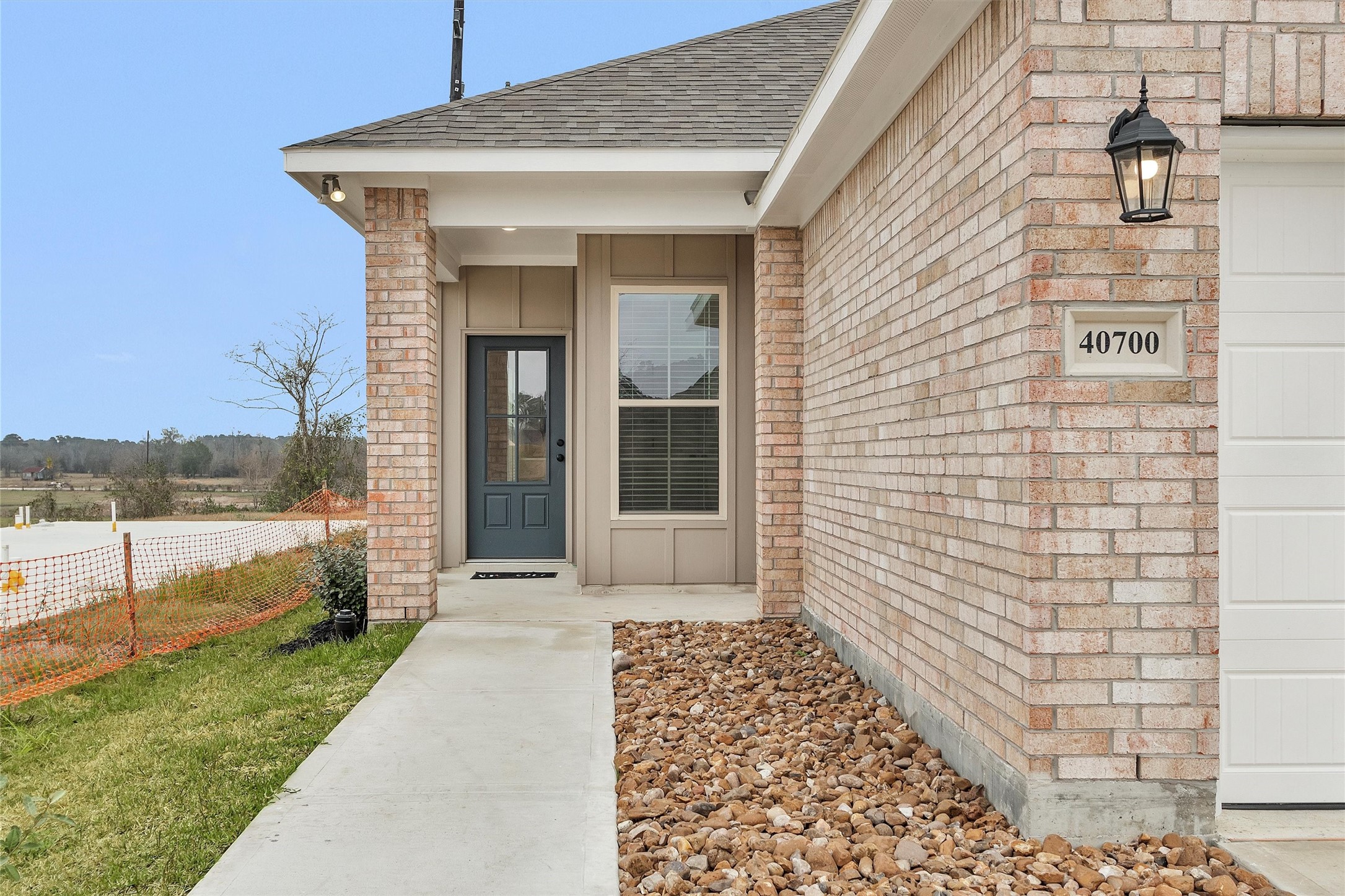 40700 Pessi Road Magnolia, TX 77354 - Photo 3 of 29 a view of a porch with a table and chair