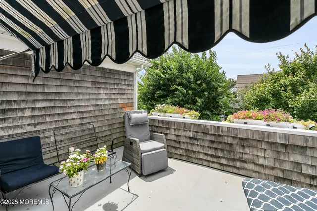 a bedroom with a bed and a table in it