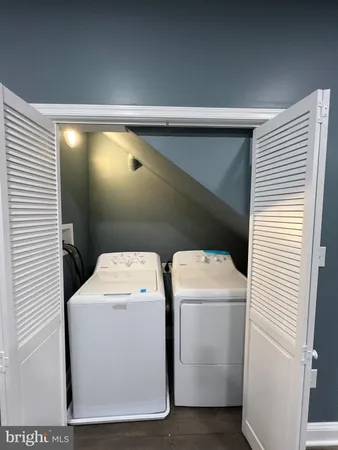 a utility room with dryer and washer