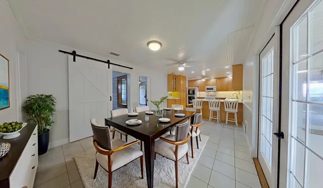 a view of swimming pool with a lounge chair
