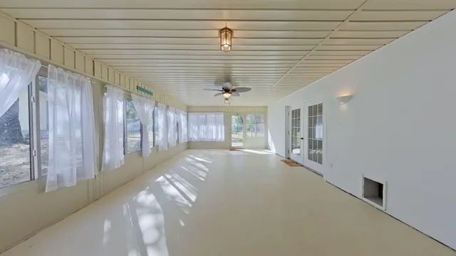 a view of a livingroom with furniture